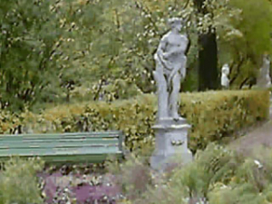 statue beside bench